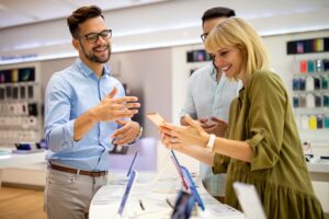 Sales consultant using sales communication techniques with customers